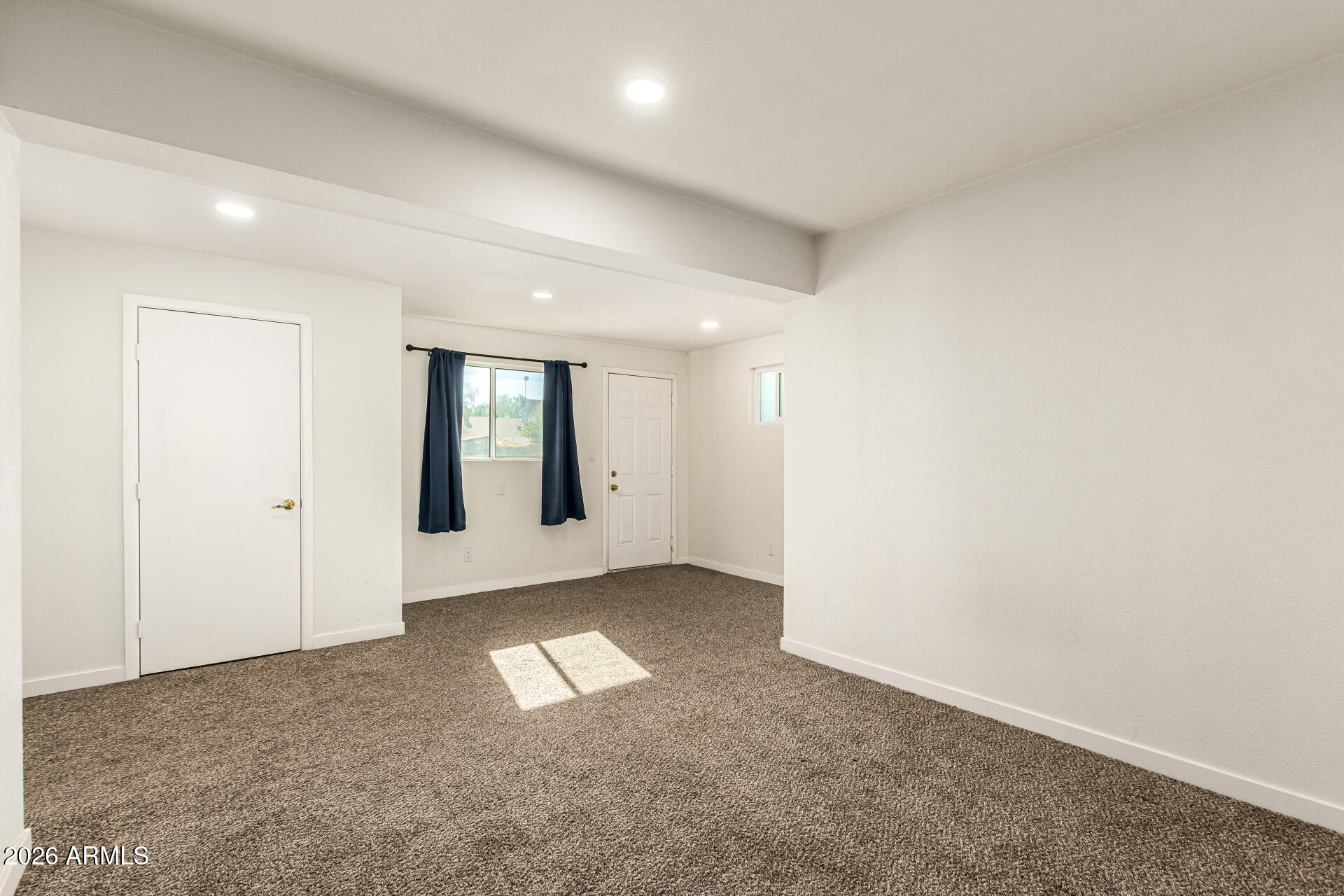 1609 West Mission Lane Phoenix, AZ 85021 - Photo 19 of 36 an empty room with windows