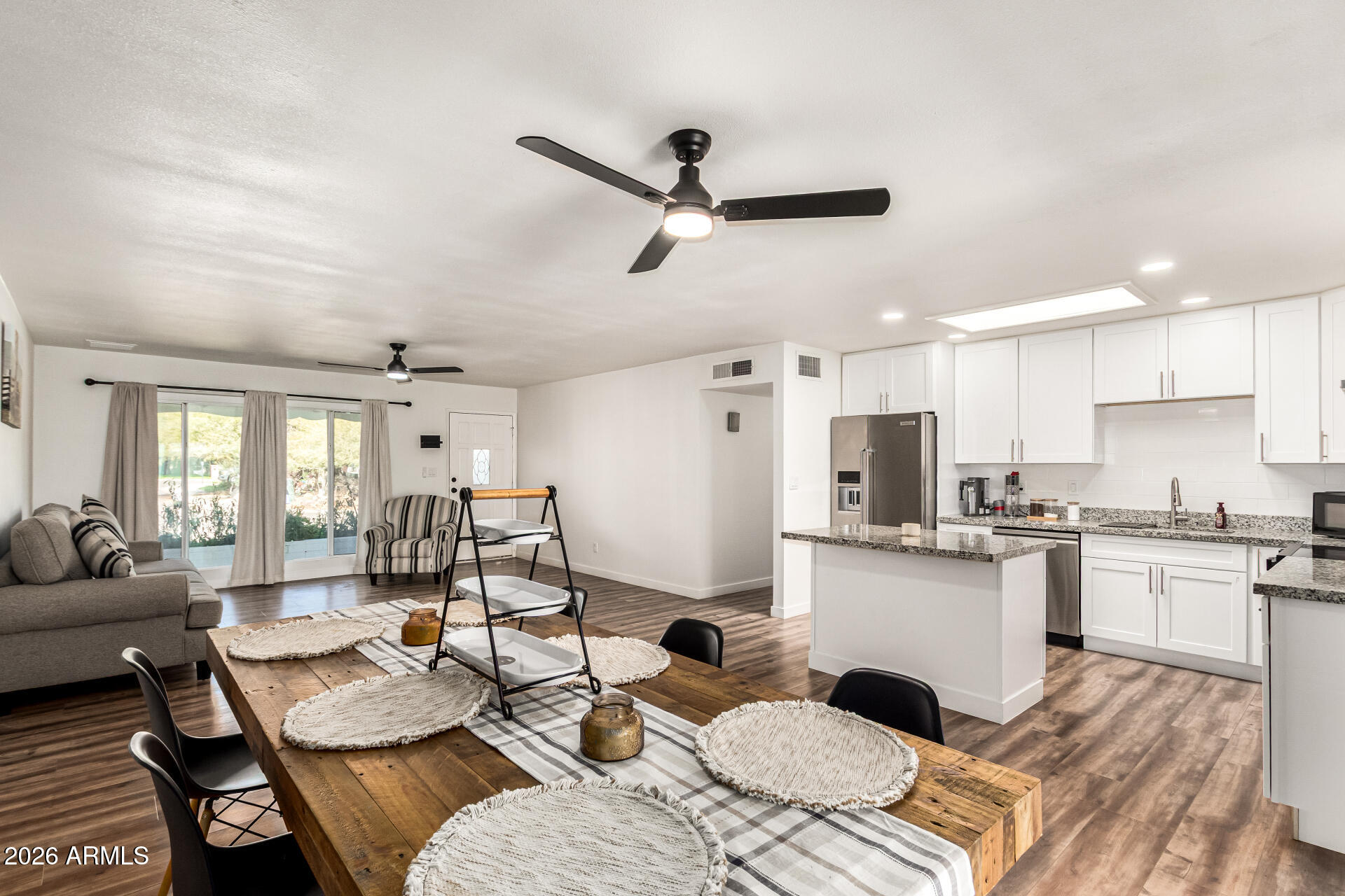1609 West Mission Lane Phoenix, AZ 85021 - Photo 2 of 36 a living room with lots of furniture and kitchen view