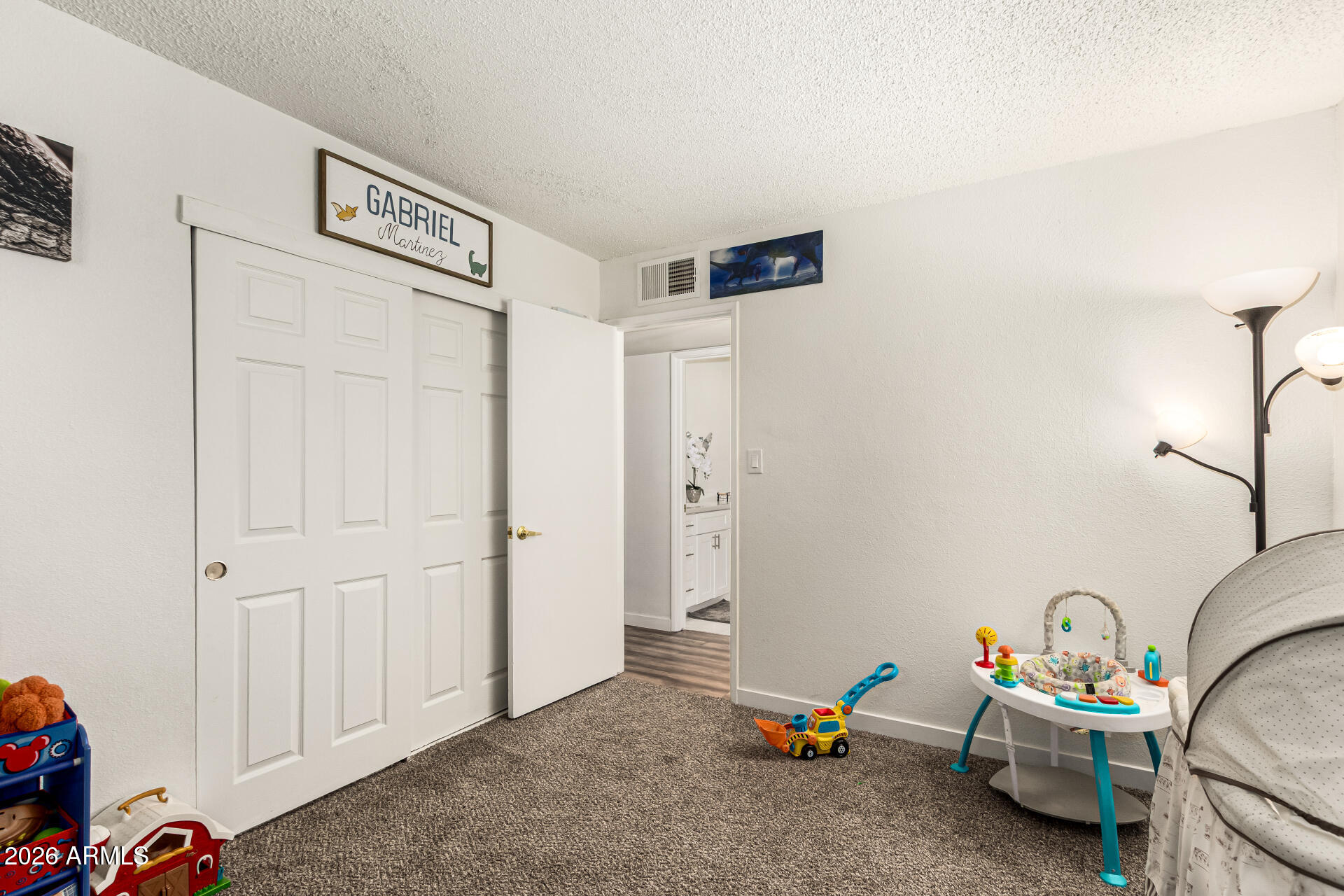 1609 West Mission Lane Phoenix, AZ 85021 - Photo 26 of 36 a children room with toys and white walls