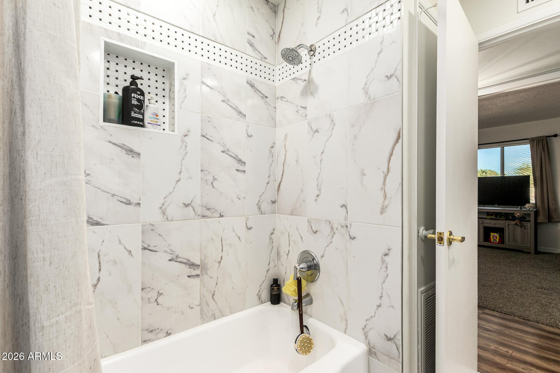 1609 West Mission Lane Phoenix, AZ 85021 - Photo 27 of 36 a bathroom with a bathtub and shower