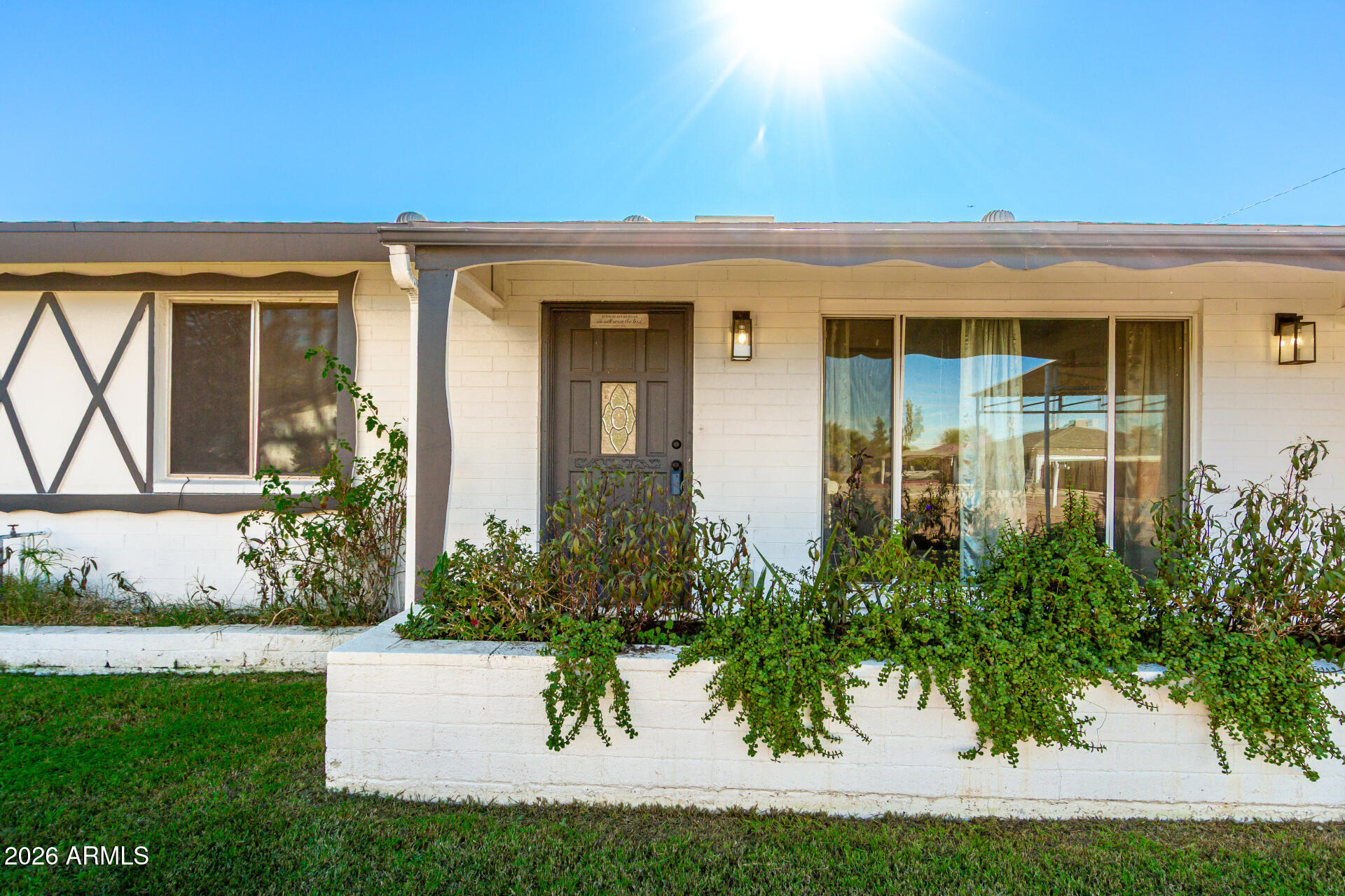 1609 West Mission Lane Phoenix, AZ 85021 - Photo 8 of 36 front view of a house with a yard