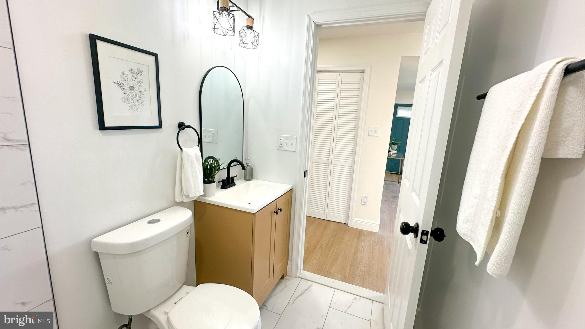 5627 McClean Boulevard Baltimore, MD 21214 - Photo 15 of 38 Guest Bath to Laundry