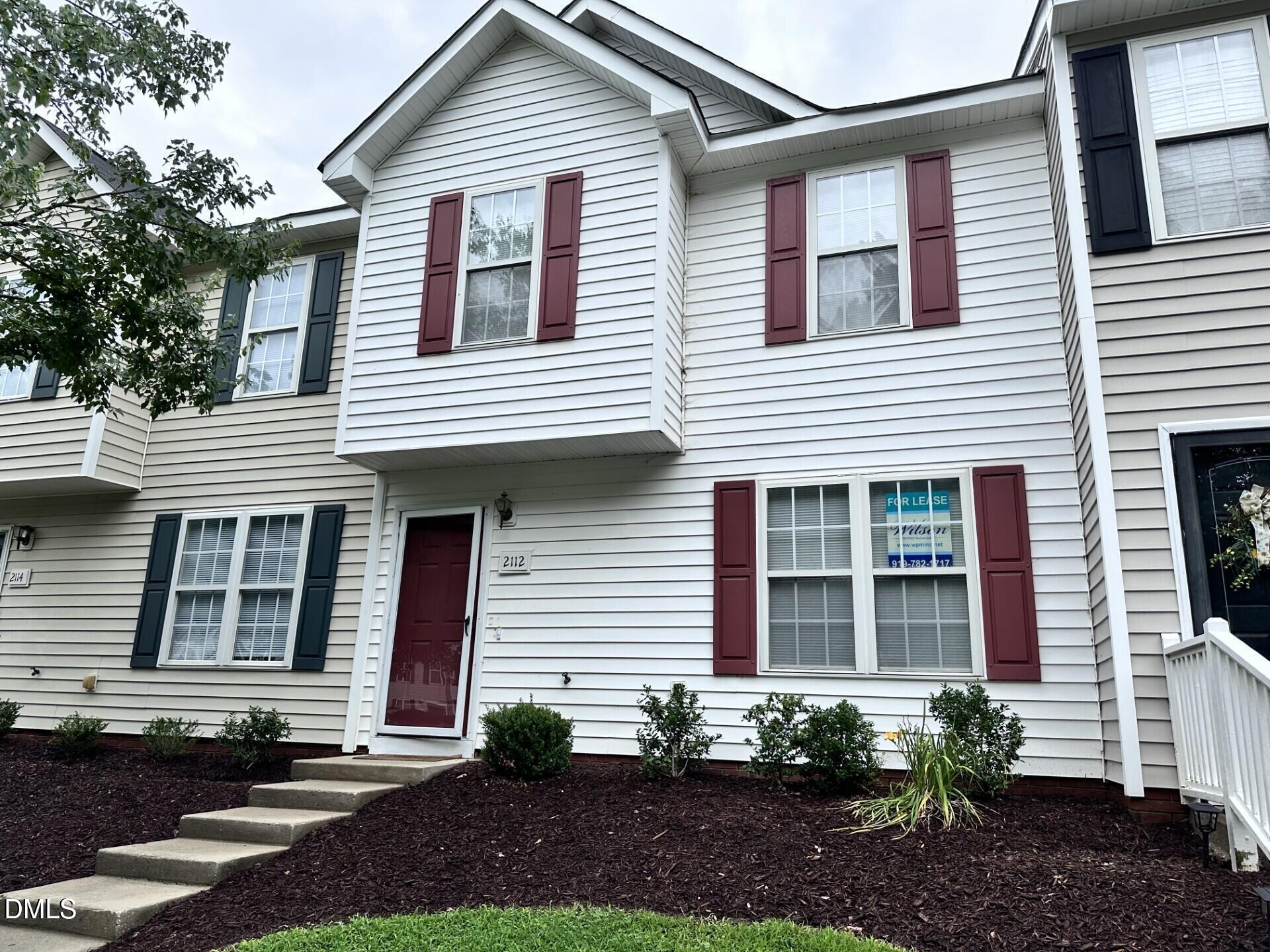 2112 Walnut Bluffs Lane Raleigh, NC 27610 - Photo 1 of 17 a front view of a house
