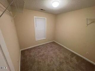 2112 Walnut Bluffs Lane Raleigh, NC 27610 - Photo 11 of 17 an empty room with a window