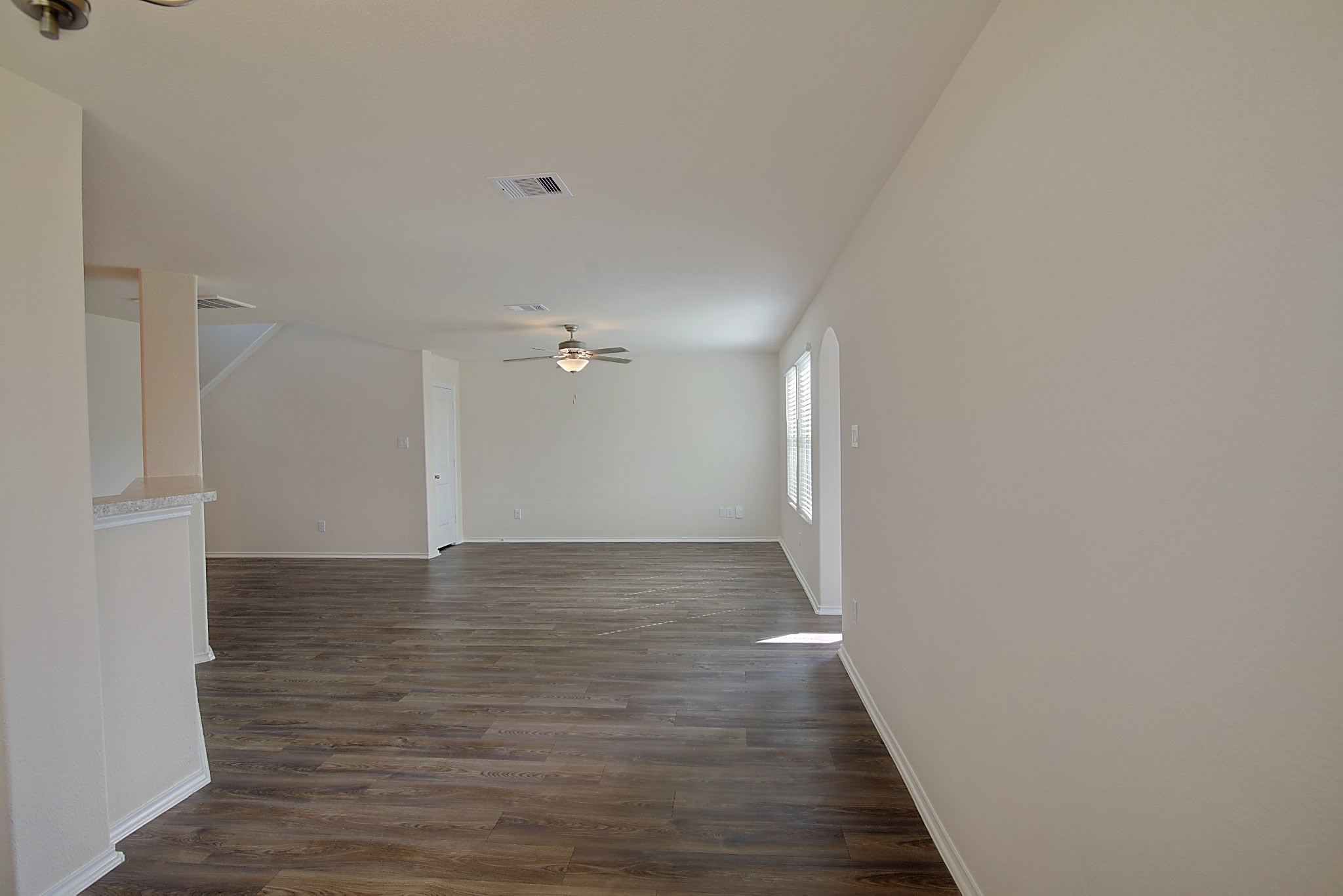 14417 Conifer Drive Conroe, TX 77302 - Photo 13 of 20 a view of a hallway with wooden floor