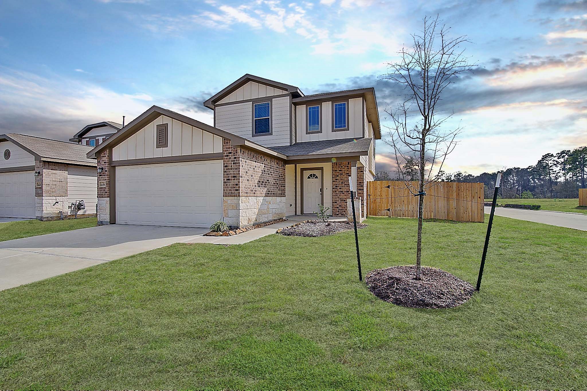 14417 Conifer Drive Conroe, TX 77302 - Photo 2 of 20 a house that has a garden