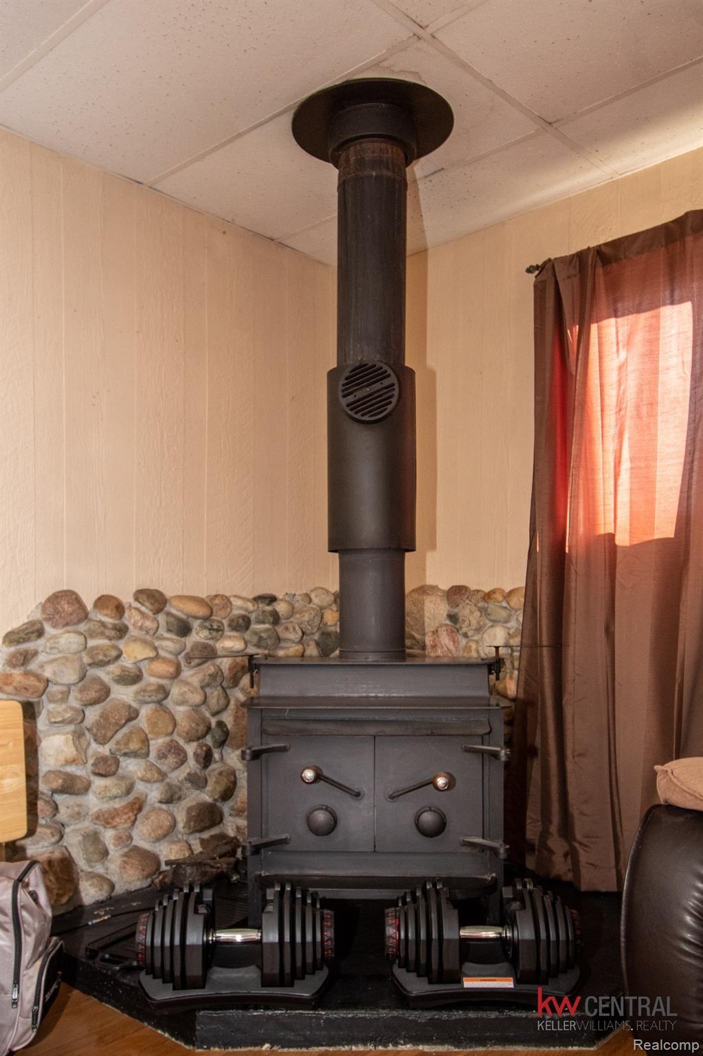 5032 Oakhill Road Clarkston, MI 48348 - Photo 12 of 27 Wood Burning Stove.jpg