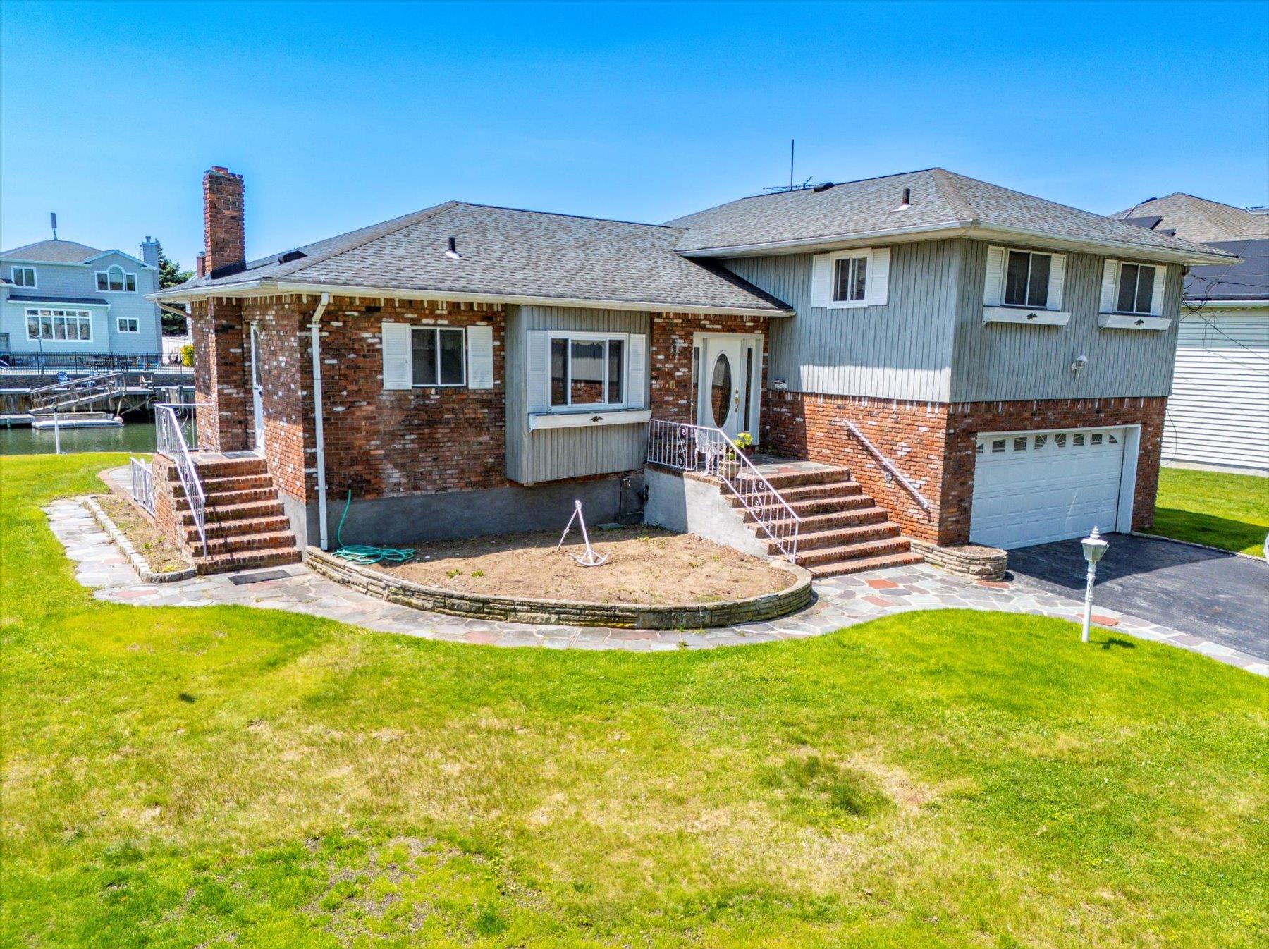 a front view of a house with swimming pool