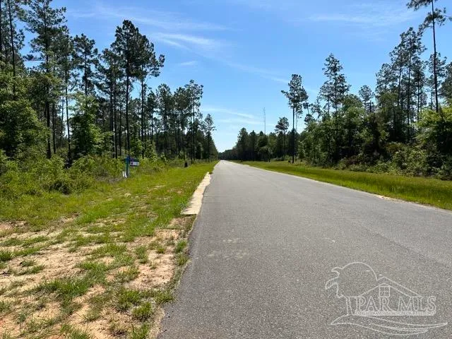 a view of a golf course with a yard