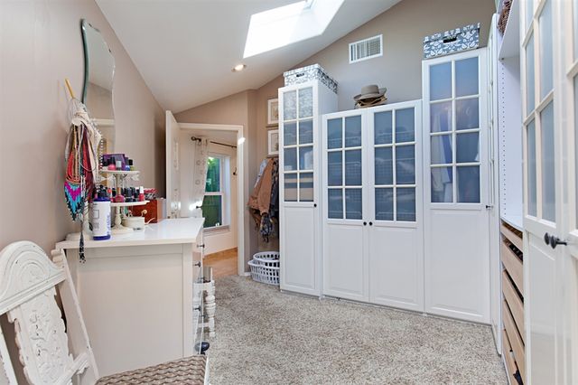 a view of livingroom with furniture and toys