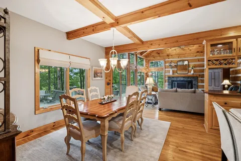 a kitchen with stainless steel appliances granite countertop a sink and a stove