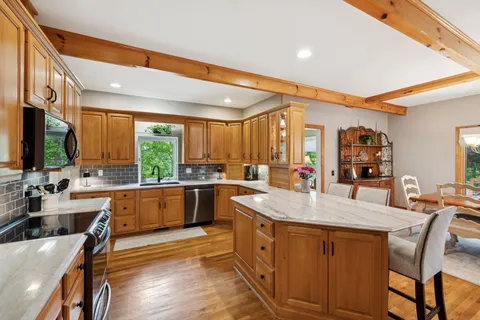 a bedroom with furniture and a window
