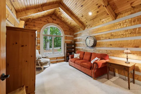 a spacious bathroom with a double vanity sink mirror and shower