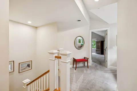 a room with gym equipment and mirror