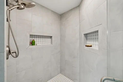 a view of a house with backyard porch and sitting area