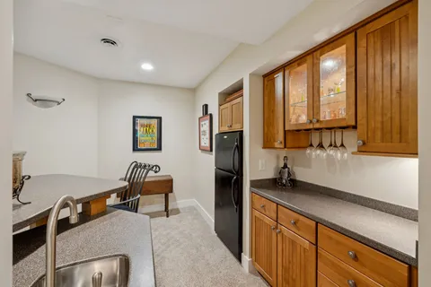 a view of a park with large trees