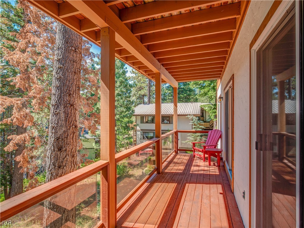 1368 Zurich Lane Incline Village, NV 89451 - Photo 19 of 34 a balcony with wooden floor and outdoor seating