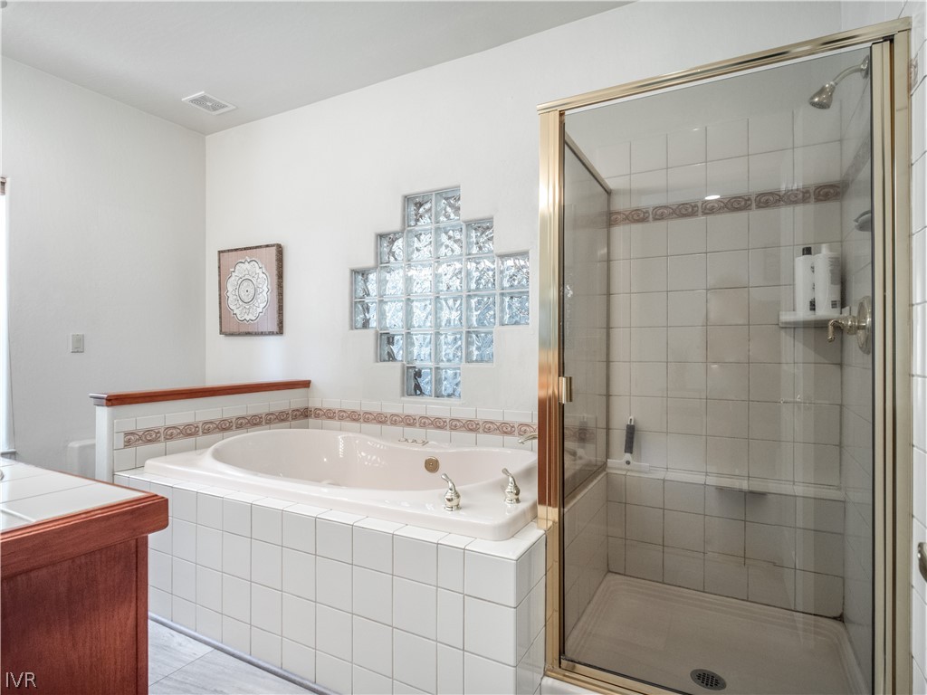 1368 Zurich Lane Incline Village, NV 89451 - Photo 24 of 34 a bathroom with a bathtub and shower