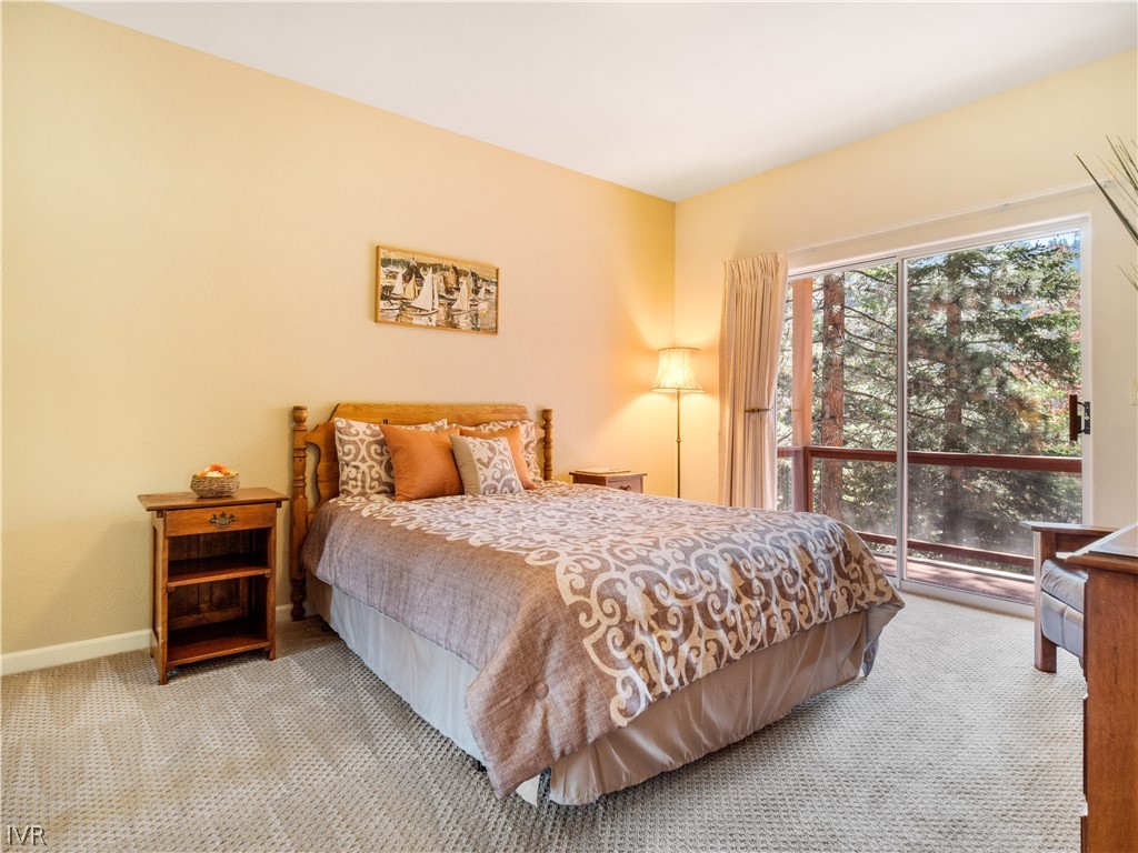 1368 Zurich Lane Incline Village, NV 89451 - Photo 25 of 34 a bedroom with a bed painting and a large window