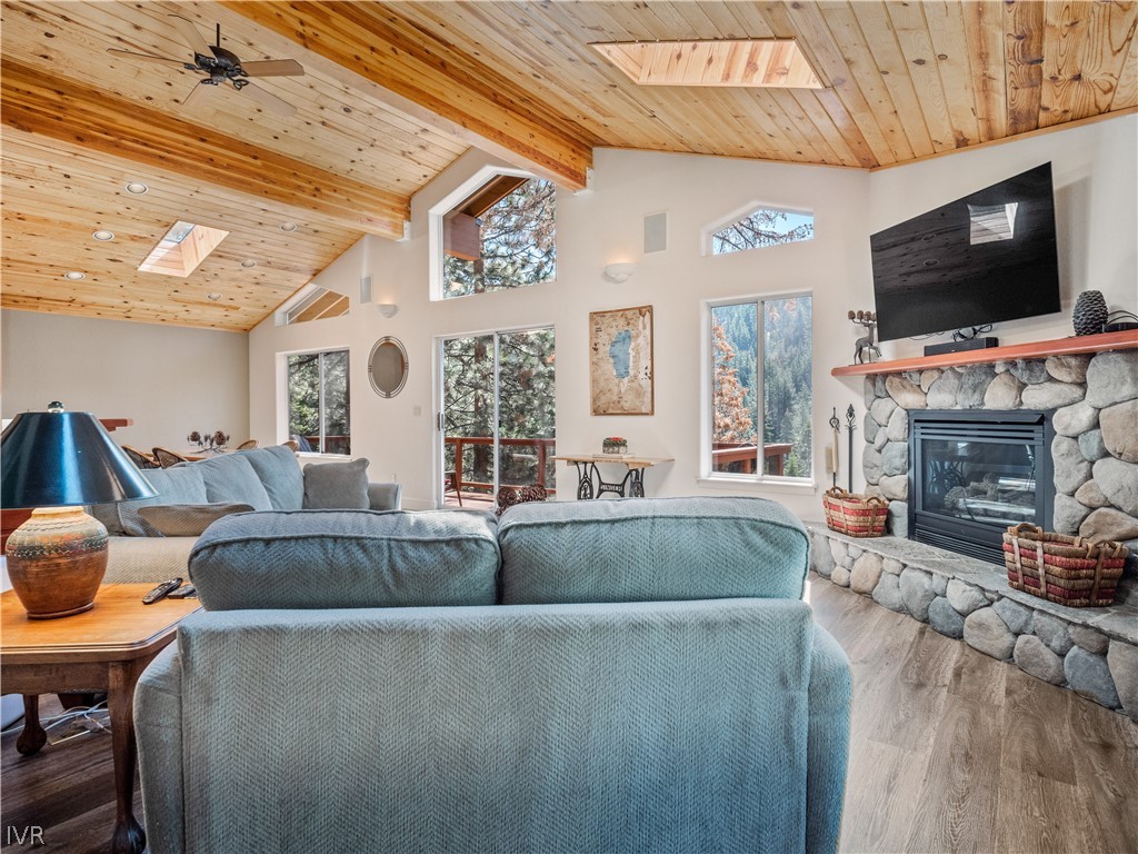 1368 Zurich Lane Incline Village, NV 89451 - Photo 7 of 34 a living room with furniture a flat screen tv and a fireplace