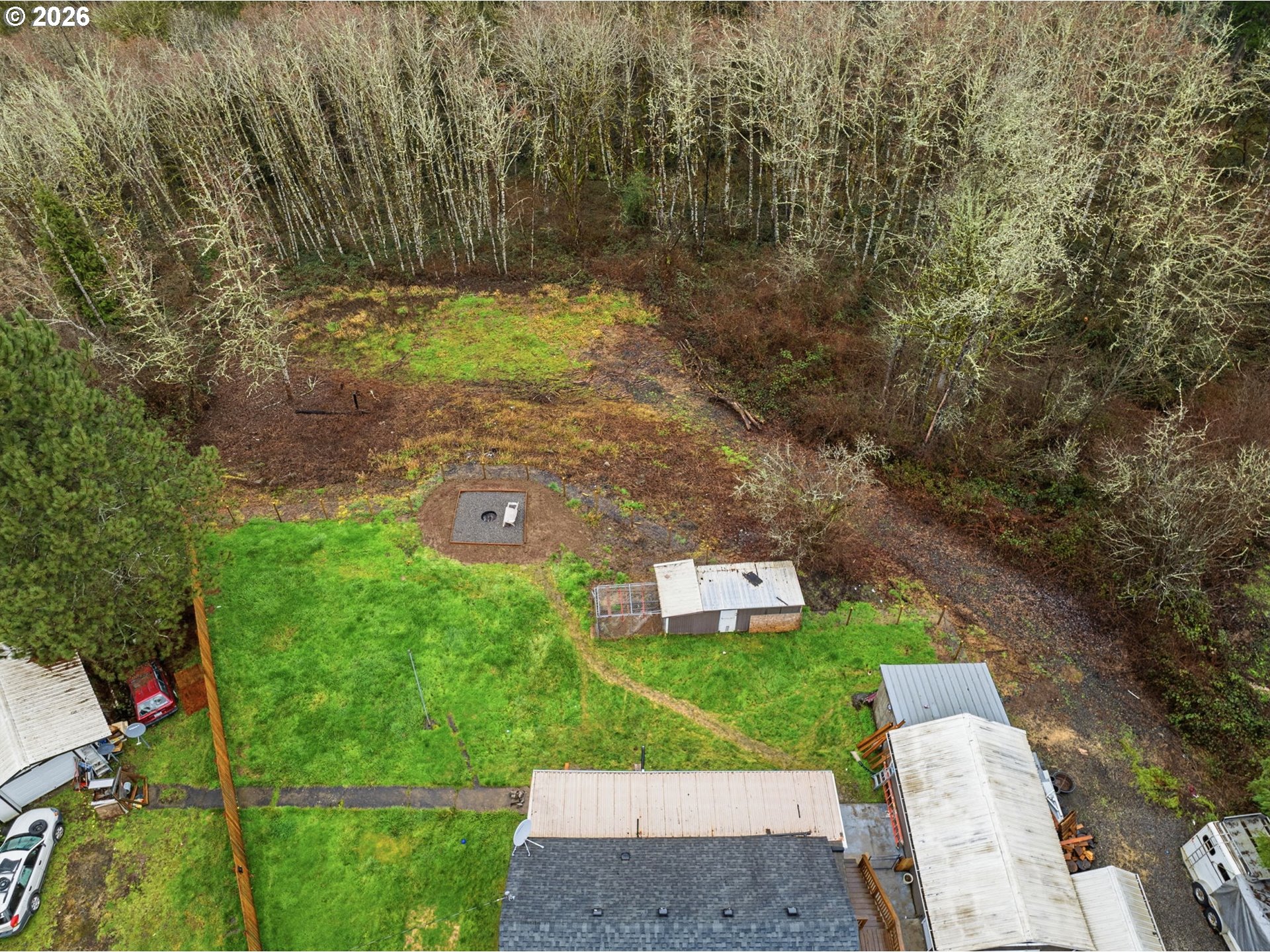 228 Holcomb Spur Road Kelso, WA 98626 - Photo 22 of 23 a aerial view of a house with a yard