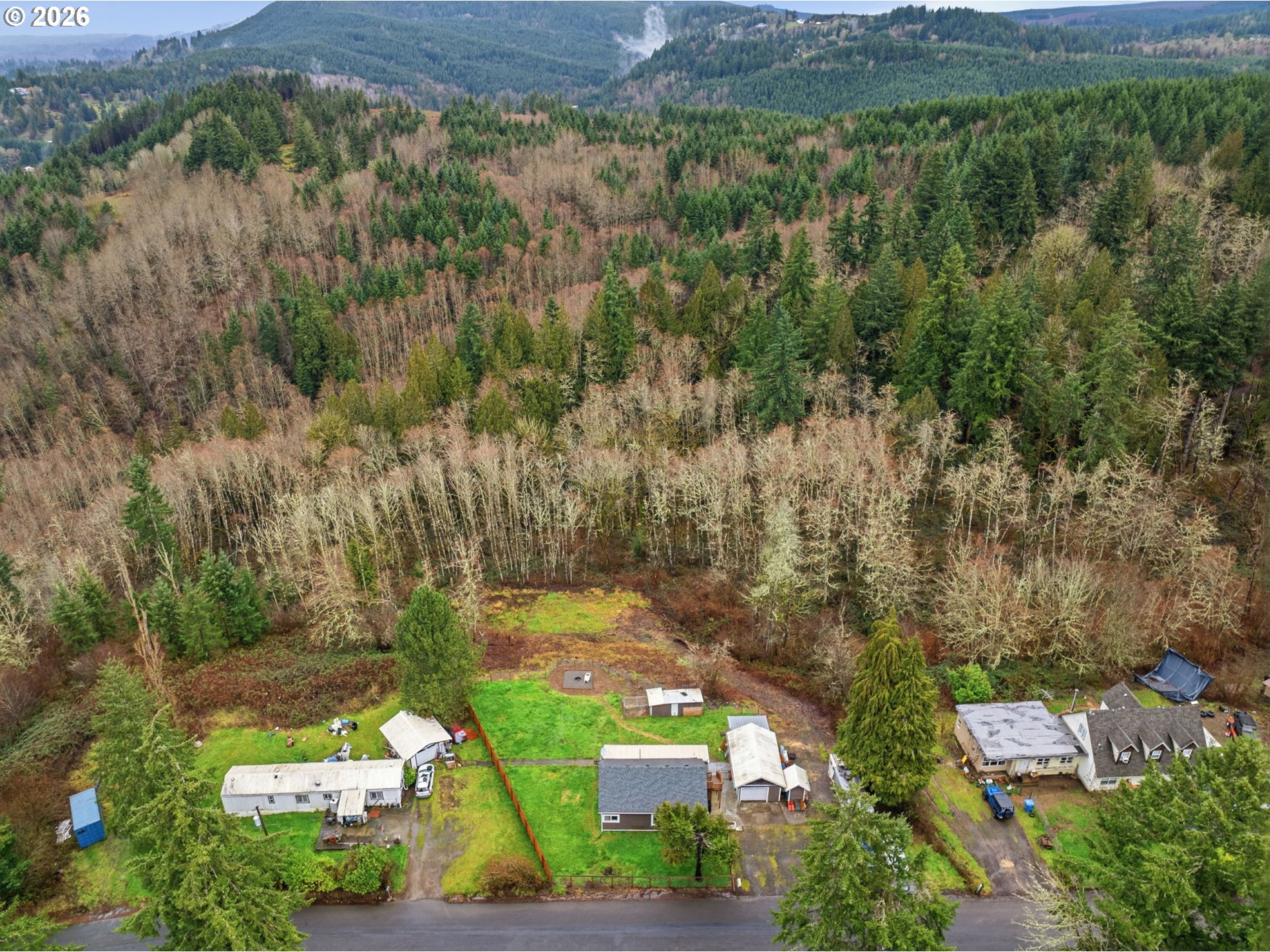 228 Holcomb Spur Road Kelso, WA 98626 - Photo 23 of 23 an aerial view of a house with a yard
