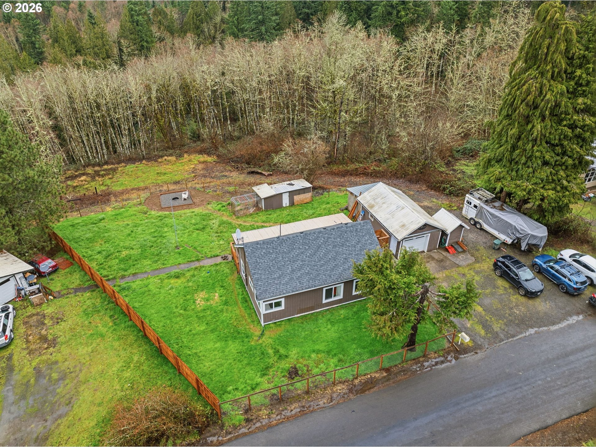 228 Holcomb Spur Road Kelso, WA 98626 - Photo 3 of 23 an aerial view of a house with a yard