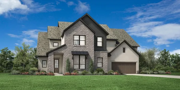 a front view of a house with a yard and trees