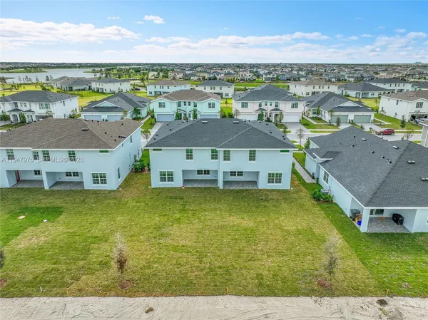 a view of a city with an ocean view