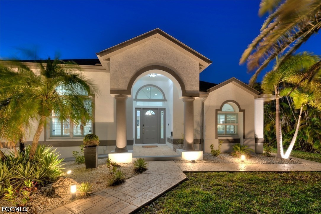 13570 Harbour Ridge Drive Fort Myers, FL 33908 - Photo 3 of 50 a view of a house with a swimming pool