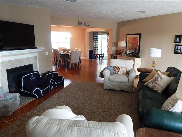 3953 Stephens Ridge Way Antioch, TN 37013 - Photo 6 of 13 a living room with furniture floor and a flat screen tv