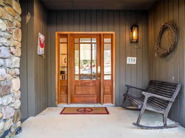 a bedroom with a bed and cabinets