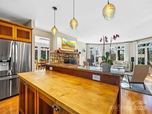 a view of kitchen and dining area with furniture