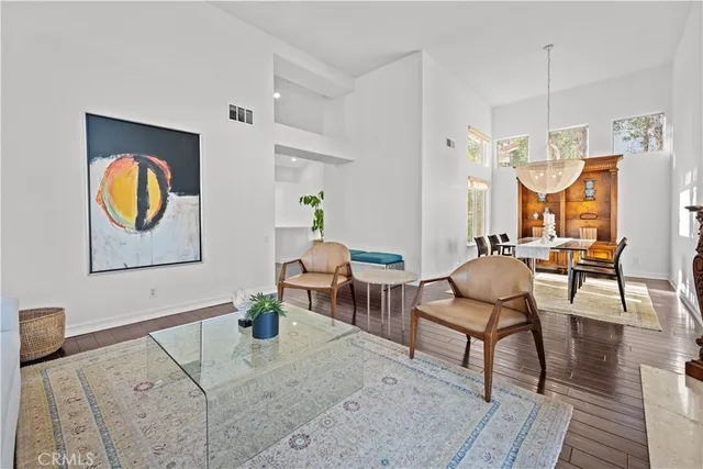a kitchen with stainless steel appliances granite countertop a stove and a refrigerator