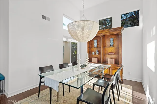 a kitchen with cabinets and window
