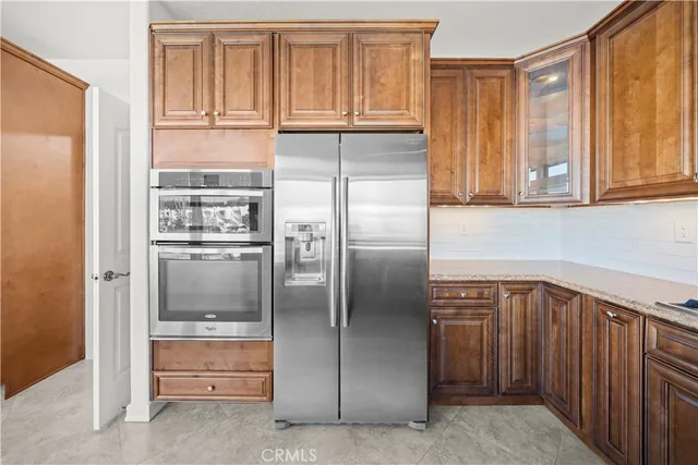 a bathroom with a sink double vanity and a mirror