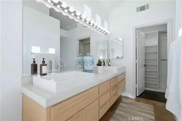 a living room with furniture a couch and a dining table