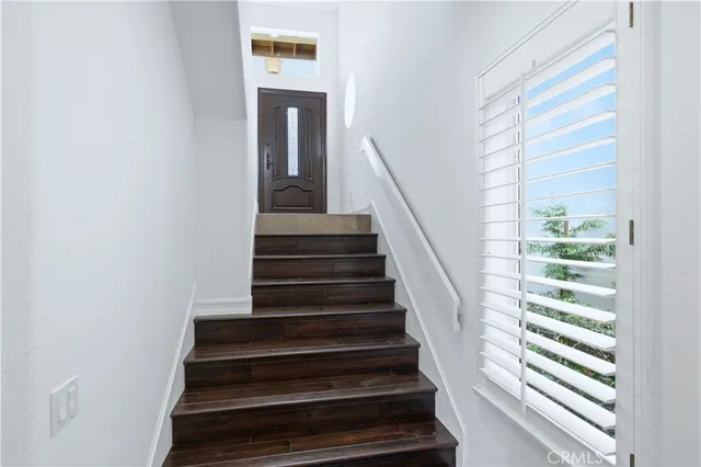 a bathroom with a shower and a toilet