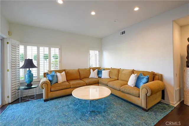a view of a lake with boats and trees in ocean