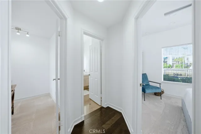 a view of a chairs and table in patio of the house