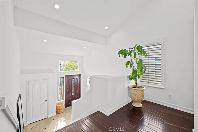 a living room with fireplace furniture and a fireplace