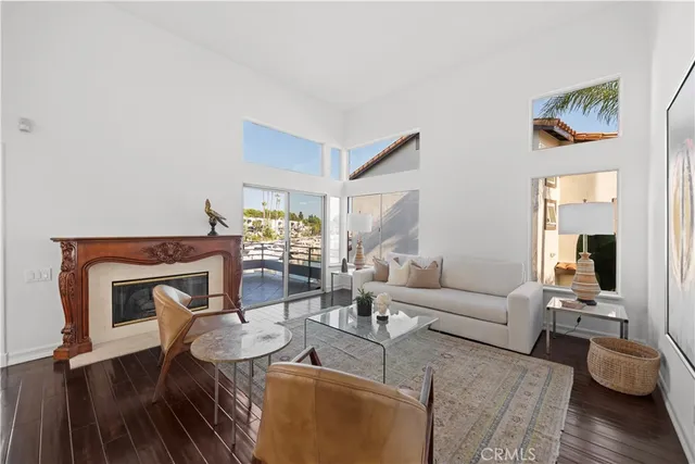 a view of a livingroom with furniture and a fireplace