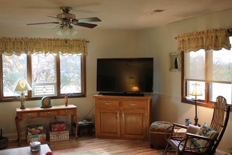 574 Sterrett Road Fairfield, VA 24435 - Photo 7 of 24 a living room with furniture a window and a flat screen tv