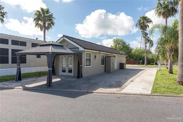 a view of a house with a patio