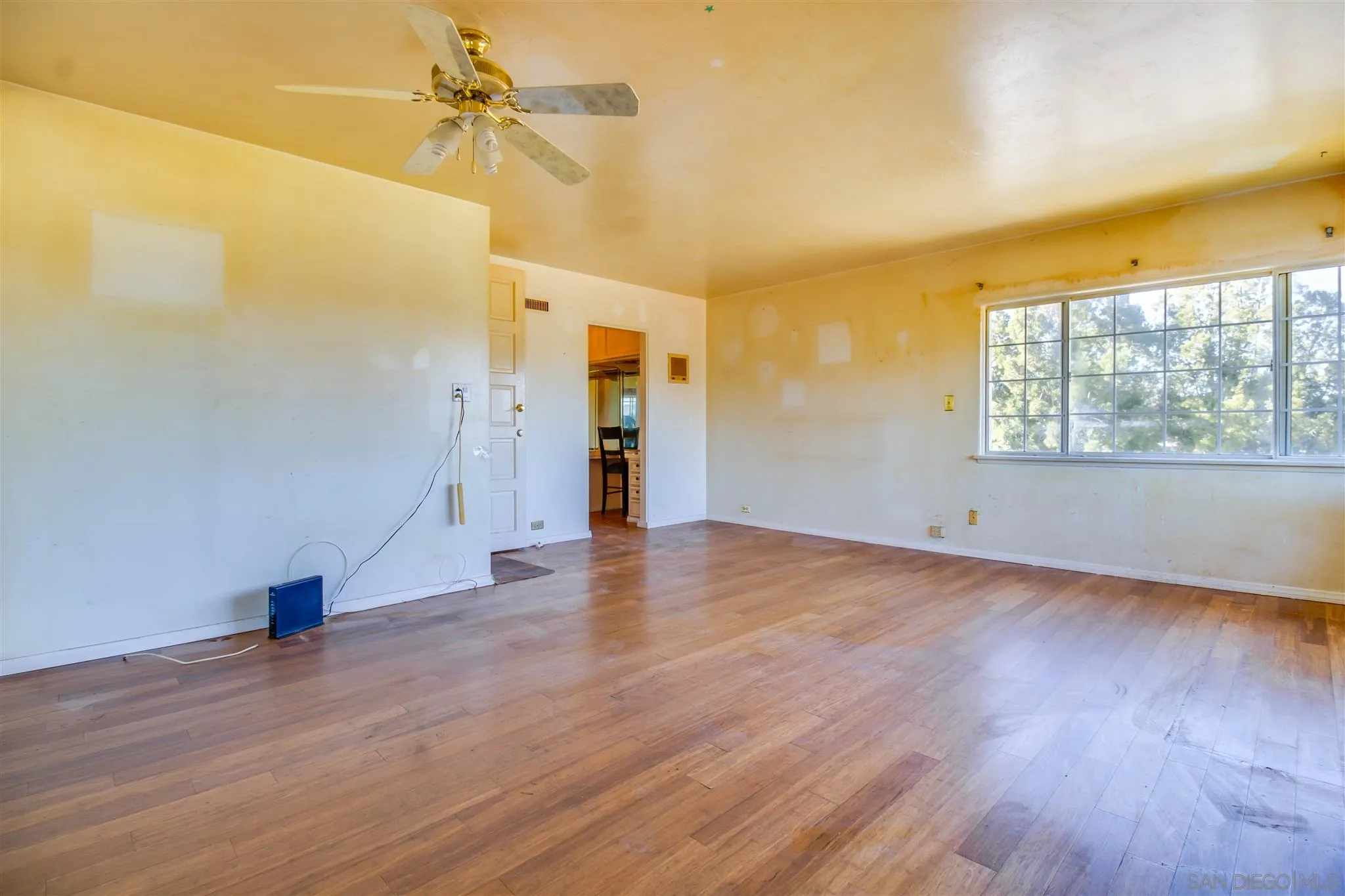10302 Don Pico Road Spring Valley, CA 91978 - Photo 20 of 30 wooden floor in an empty room with a window