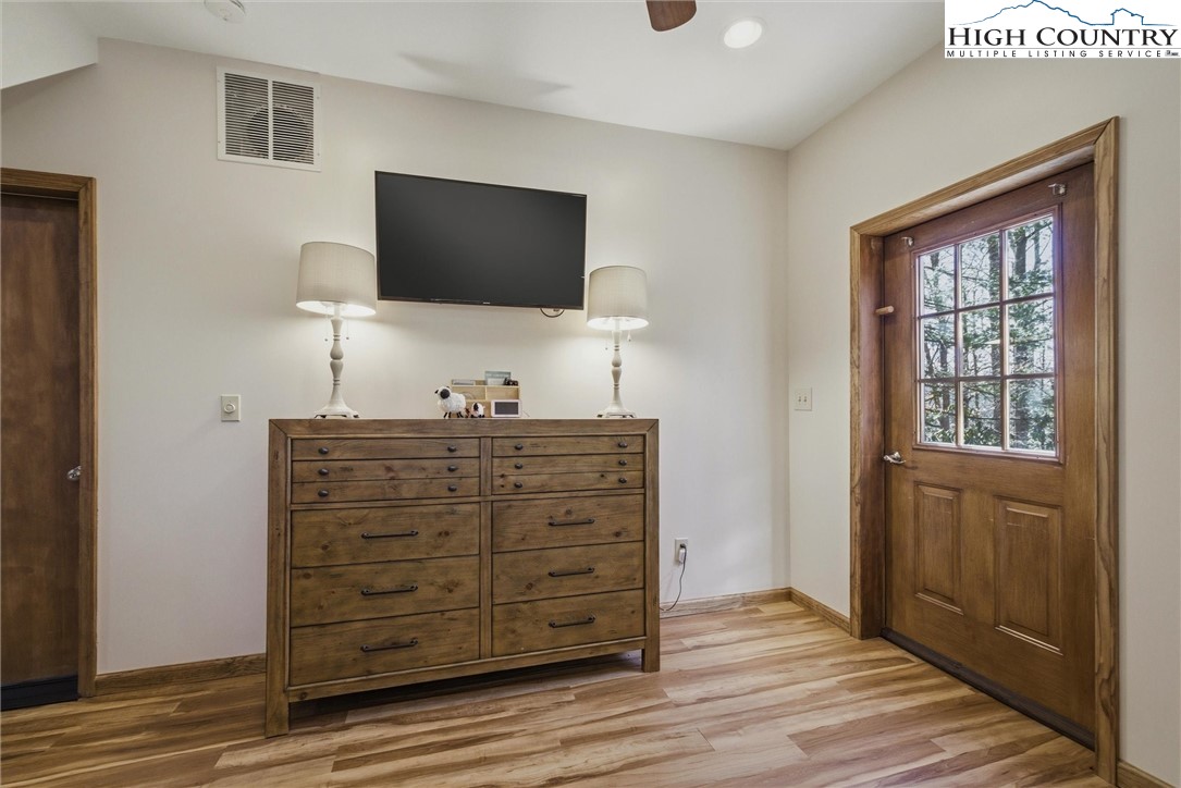 25 Poke Road Newland, NC 28657 - Photo 21 of 33 a living room with furniture and a flat screen tv