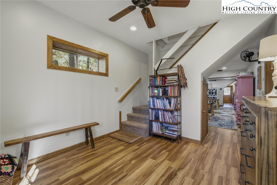 25 Poke Road Newland, NC 28657 - Photo 22 of 33 a view of a livingroom with furniture and staircase
