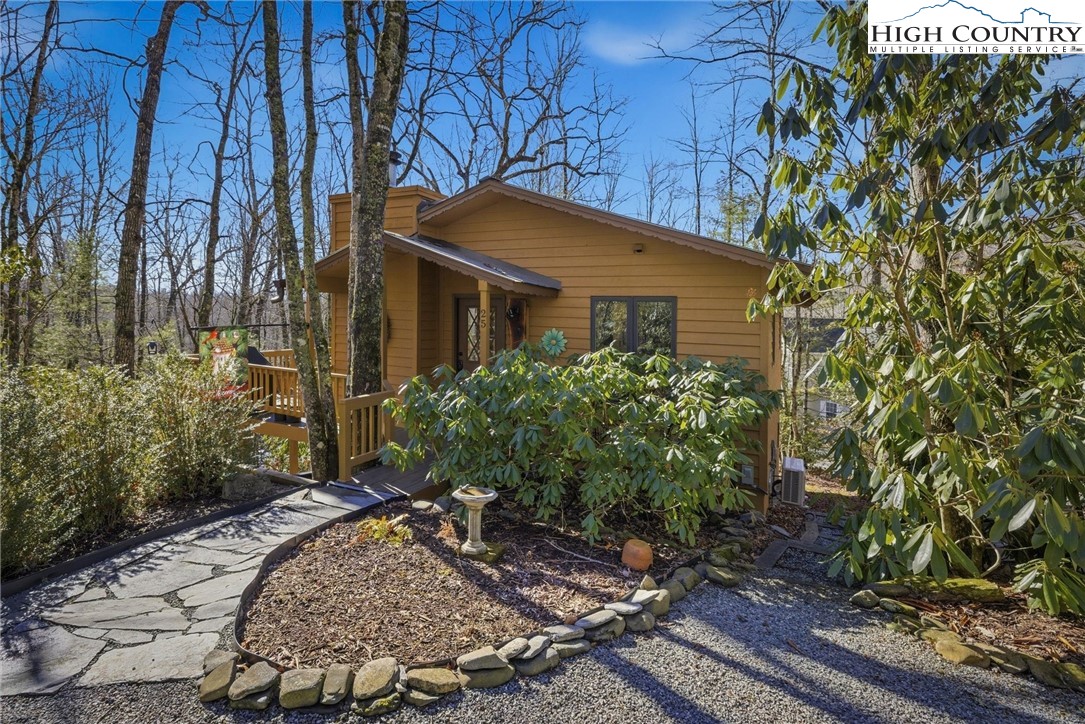 25 Poke Road Newland, NC 28657 - Photo 30 of 33 a house with a tree in front of it
