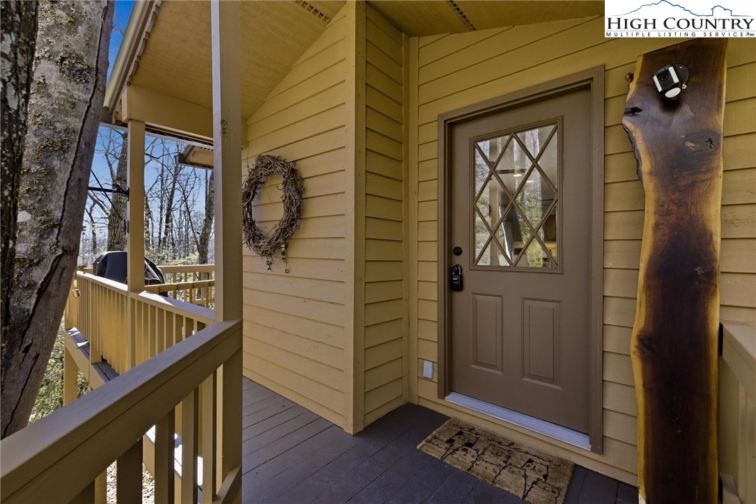 25 Poke Road Newland, NC 28657 - Photo 8 of 33 a view of front door and wooden door