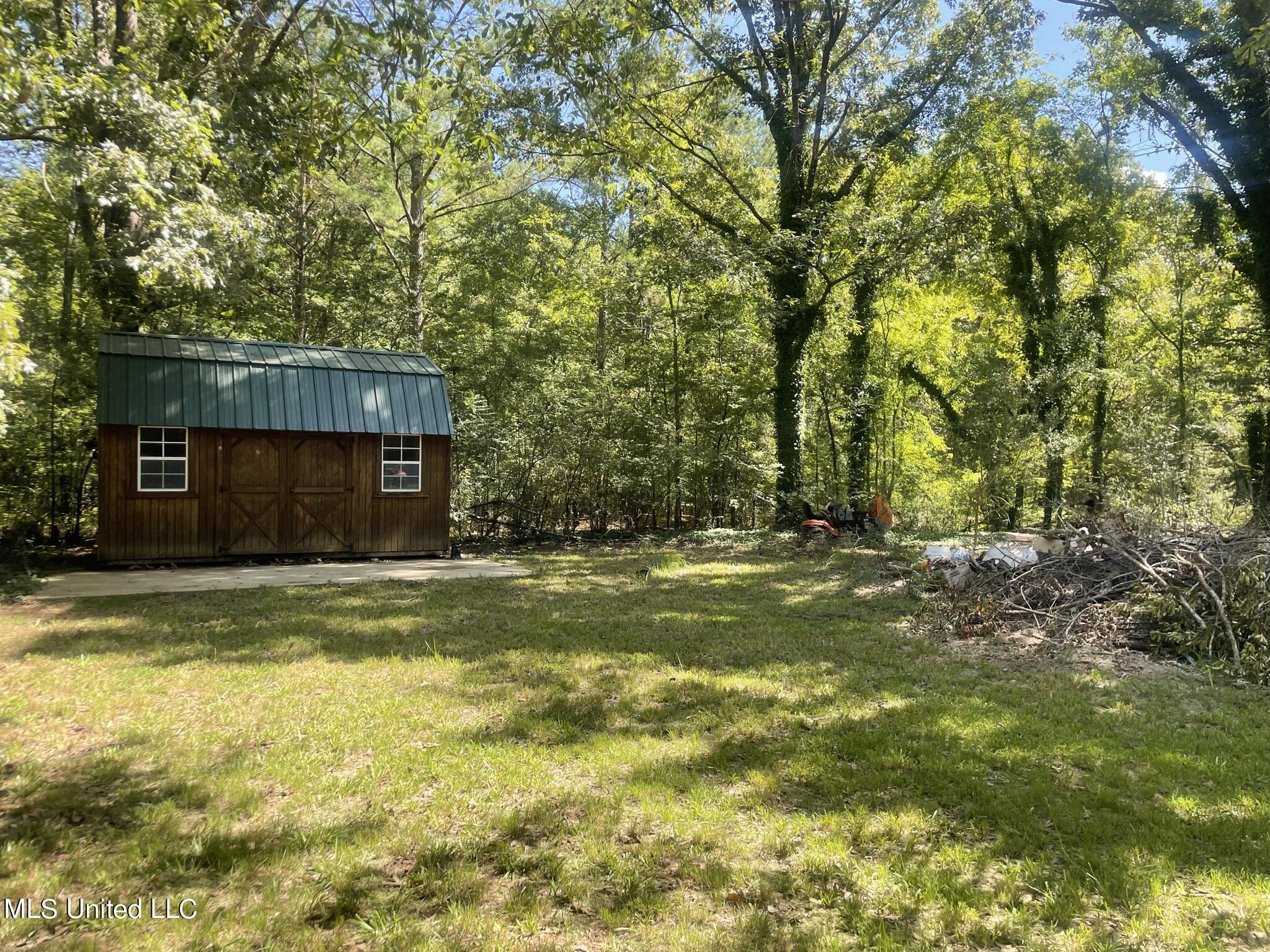519 Davis Crossing Road Canton, MS 39046 - Photo 4 of 12 E2BCD41C-5216-4E6D-AA9E-FFD3580CA5D3